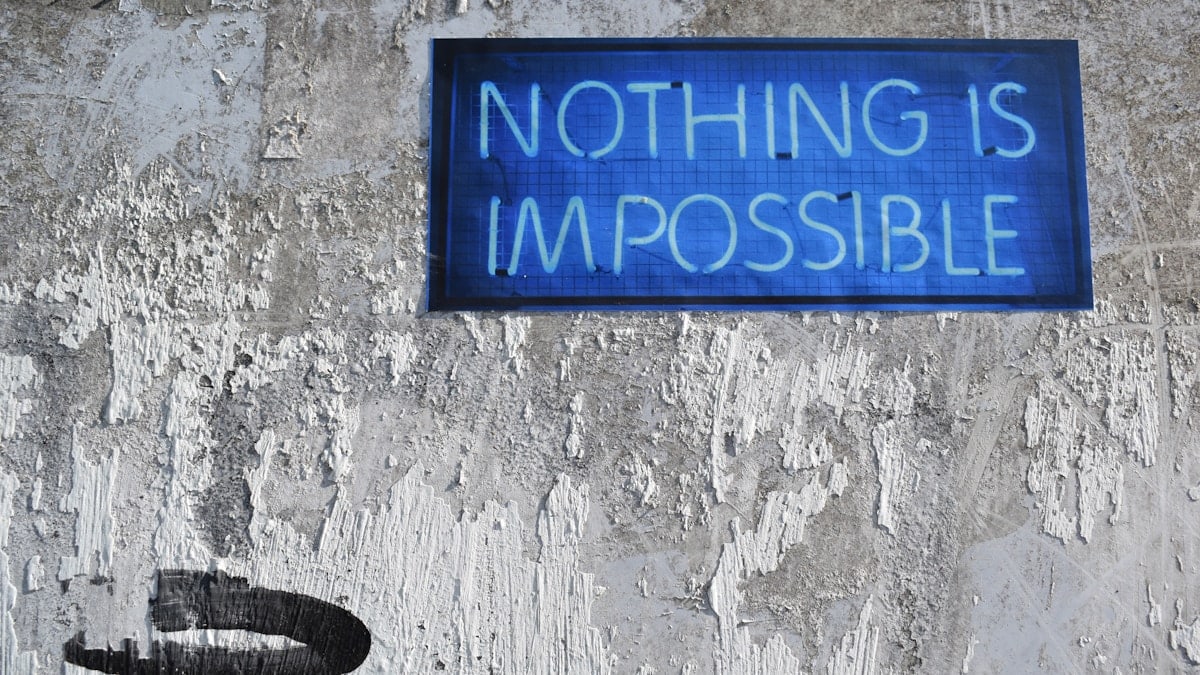 blue Nothing is Impossible neon sign